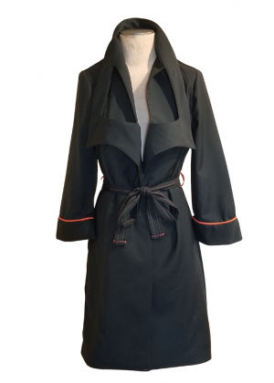 A black coat with orange and red trim on it.