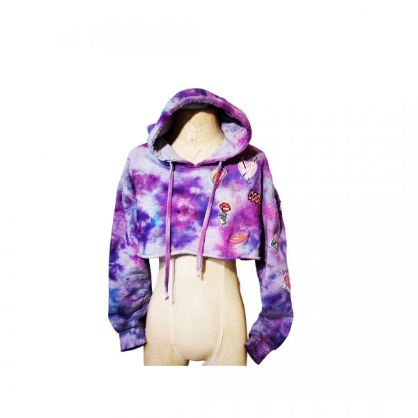A purple and blue tie dye hoodie with a patch on the front.