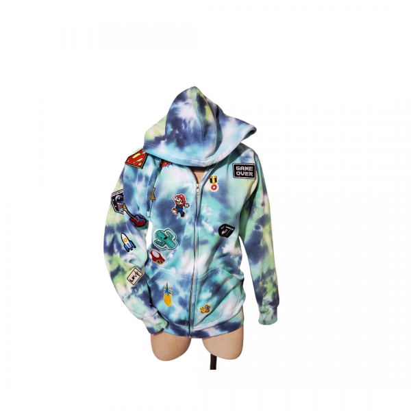 A blue tie dye hoodie with patches on the front.