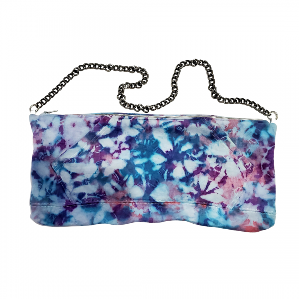 A blue and purple tie dye purse with chain strap.